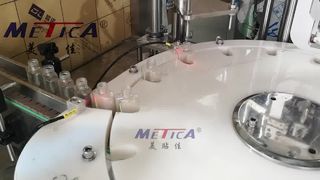 Máy chiết rót và đóng nắp bơm phun 50ml tự động
