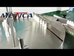 Máy đóng nắp và dán nhãn bình xịt mũi tự động