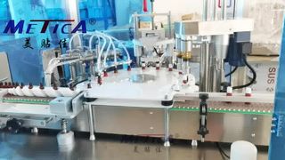 Máy dán nhãn đóng nắp chất lỏng bằng miệng